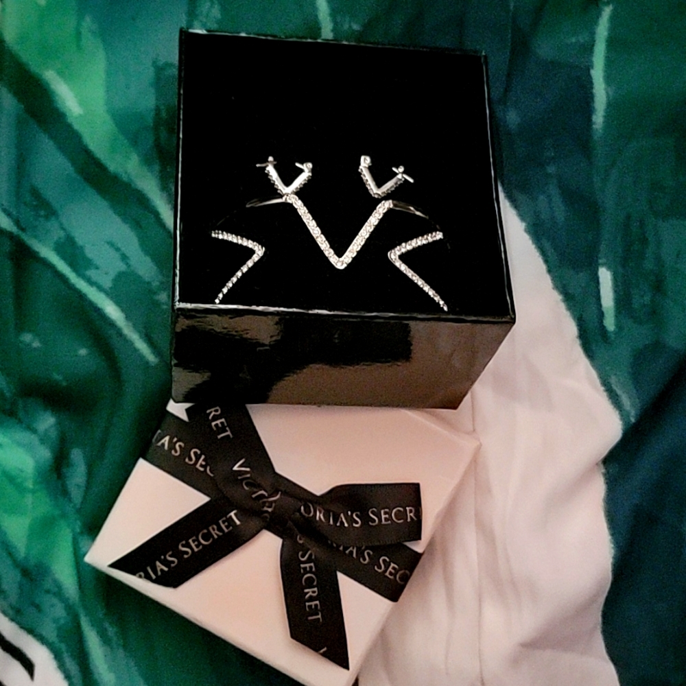 Victoria's Secret earring and bracelet set.
